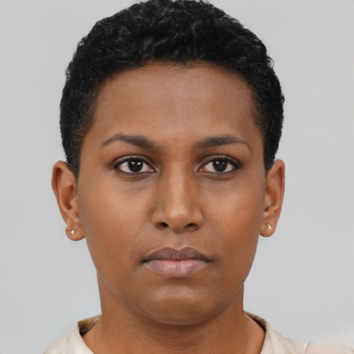 Neutral black young-adult female with short  brown hair and brown eyes
