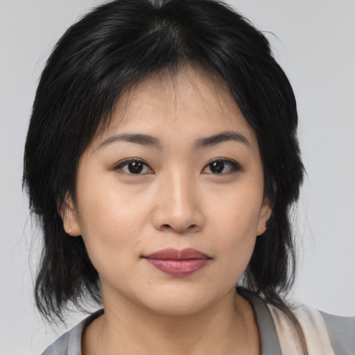 Neutral asian young-adult female with medium  black hair and brown eyes