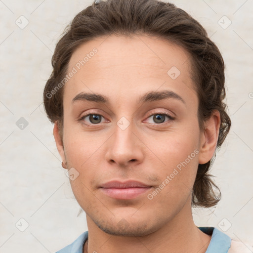 Joyful white young-adult female with short  brown hair and grey eyes