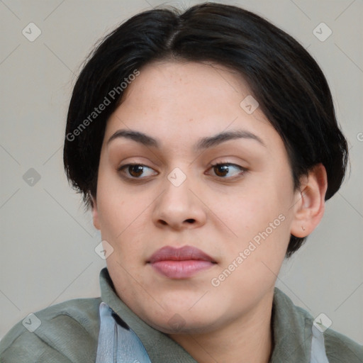 Joyful asian young-adult female with medium  black hair and brown eyes