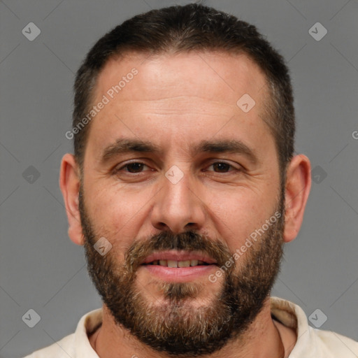 Joyful white adult male with short  brown hair and brown eyes