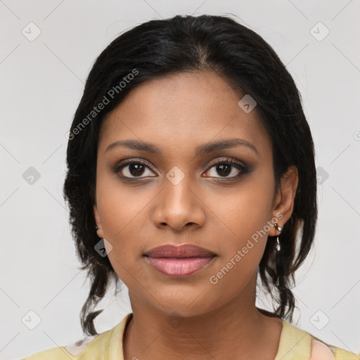 Joyful latino young-adult female with medium  brown hair and brown eyes