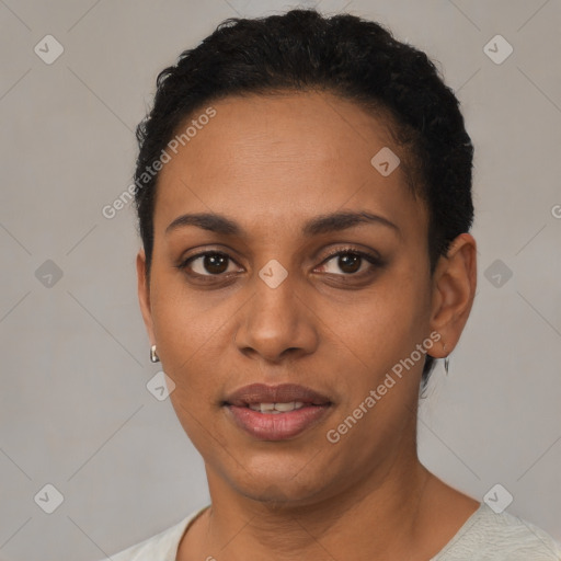 Joyful latino young-adult female with short  black hair and brown eyes