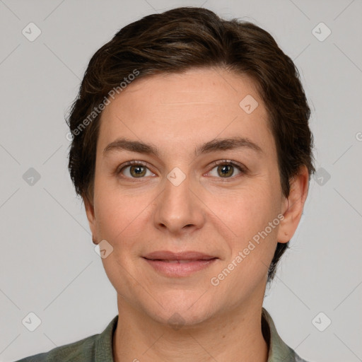 Joyful white young-adult female with short  brown hair and grey eyes