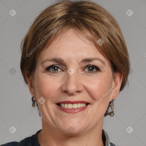 Joyful white adult female with medium  brown hair and grey eyes