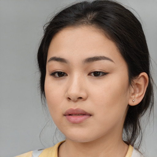 Neutral white young-adult female with medium  brown hair and brown eyes