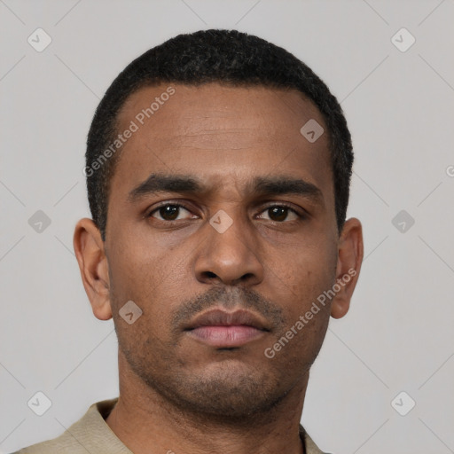 Neutral latino young-adult male with short  brown hair and brown eyes