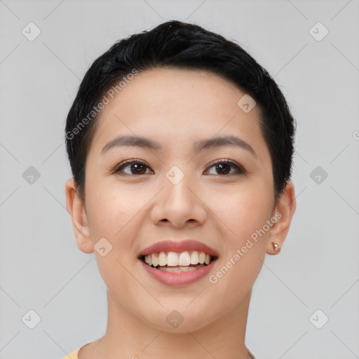 Joyful asian young-adult female with short  black hair and brown eyes