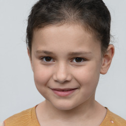 Joyful white child female with short  brown hair and brown eyes