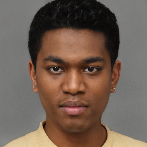 Neutral black young-adult male with short  black hair and brown eyes