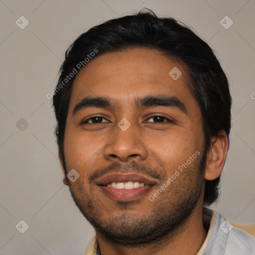 Joyful asian young-adult male with short  black hair and brown eyes