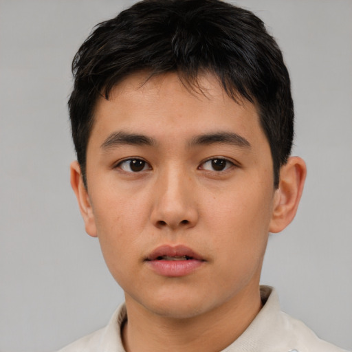 Neutral asian young-adult male with short  brown hair and brown eyes