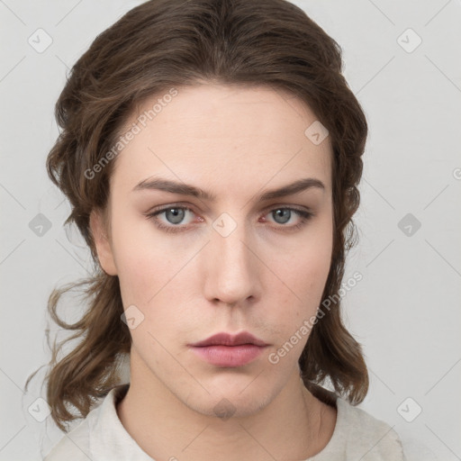 Neutral white young-adult female with medium  brown hair and grey eyes