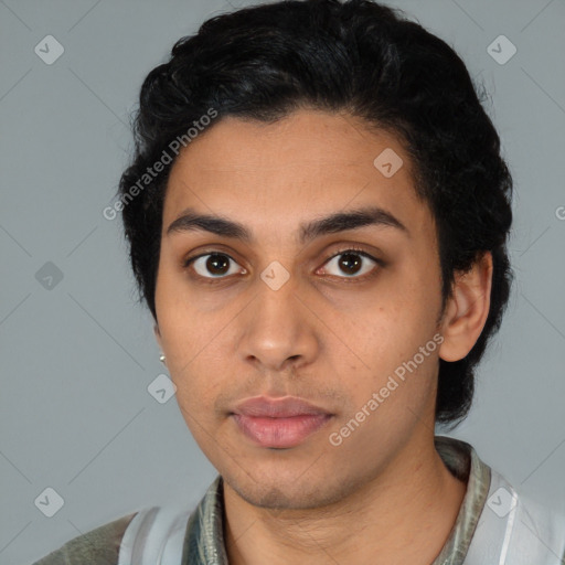 Neutral latino young-adult male with short  black hair and brown eyes