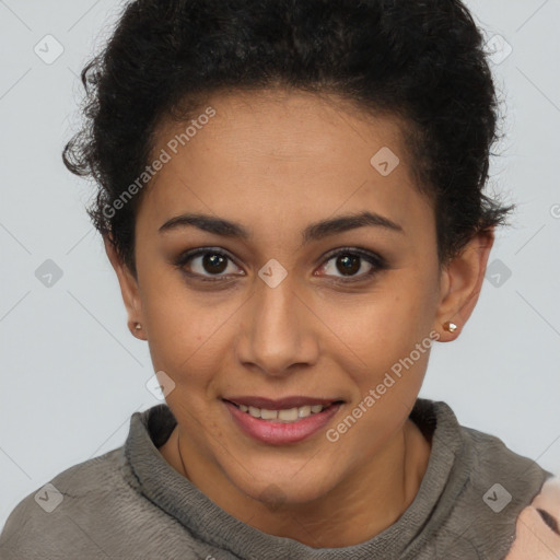 Joyful latino young-adult female with short  brown hair and brown eyes