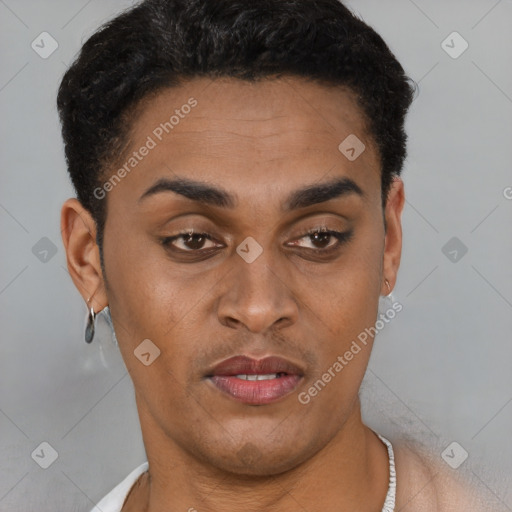 Joyful latino young-adult male with short  brown hair and brown eyes