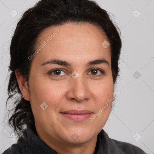 Joyful white adult female with medium  brown hair and brown eyes