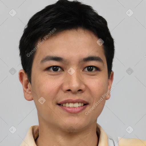 Joyful asian young-adult male with short  black hair and brown eyes