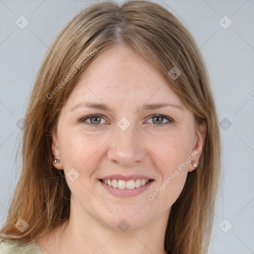 Joyful white young-adult female with medium  brown hair and grey eyes