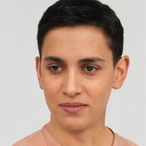 Joyful latino young-adult male with short  black hair and brown eyes
