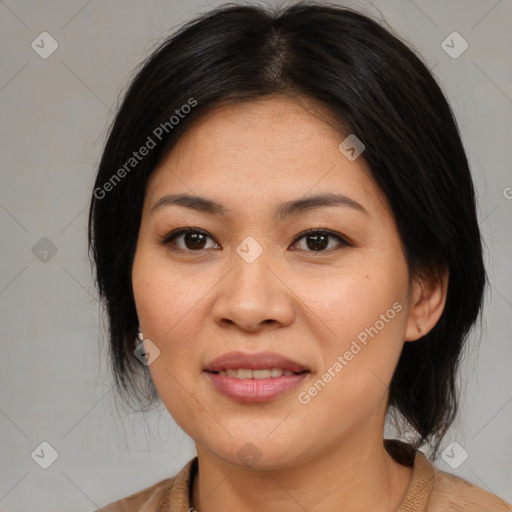 Joyful asian young-adult female with medium  brown hair and brown eyes