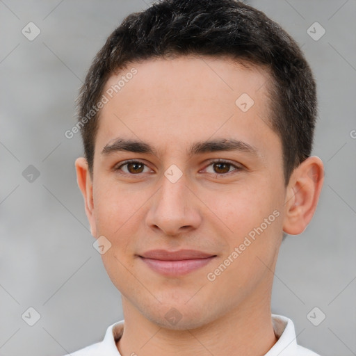 Joyful white young-adult male with short  brown hair and brown eyes