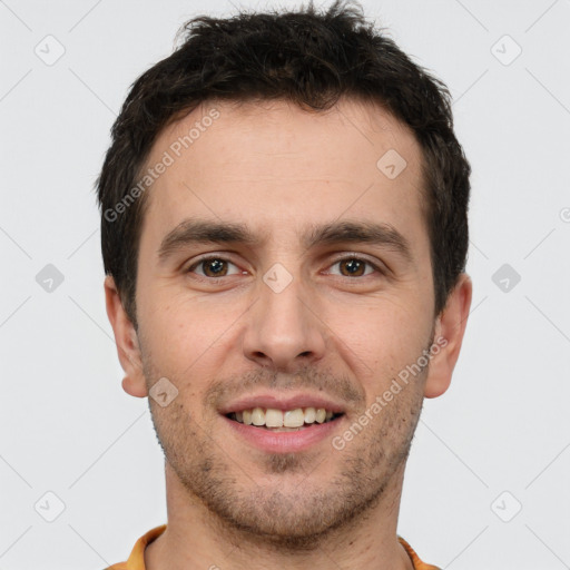 Joyful white young-adult male with short  brown hair and brown eyes