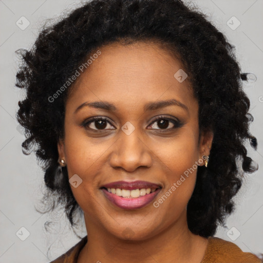 Joyful black young-adult female with long  brown hair and brown eyes