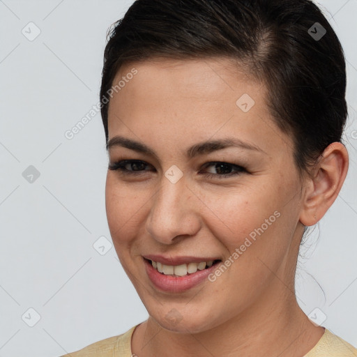 Joyful white young-adult female with short  brown hair and brown eyes