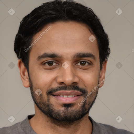 Joyful latino young-adult male with short  black hair and brown eyes