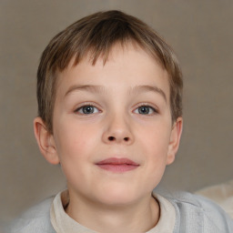 Joyful white child male with short  brown hair and brown eyes