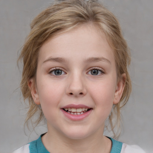 Joyful white child female with medium  brown hair and blue eyes