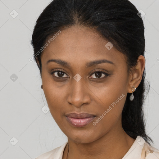 Joyful latino young-adult female with medium  brown hair and brown eyes