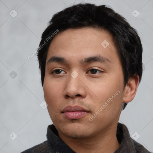 Neutral asian young-adult male with short  black hair and brown eyes