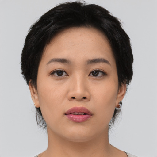 Neutral asian young-adult female with medium  black hair and brown eyes