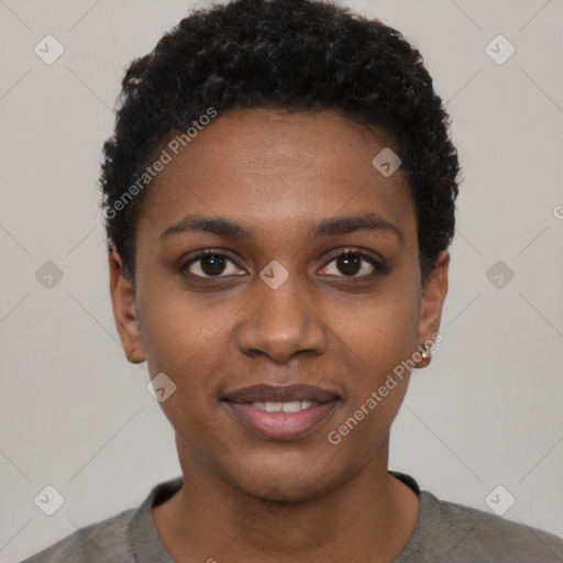 Joyful black young-adult female with short  black hair and brown eyes