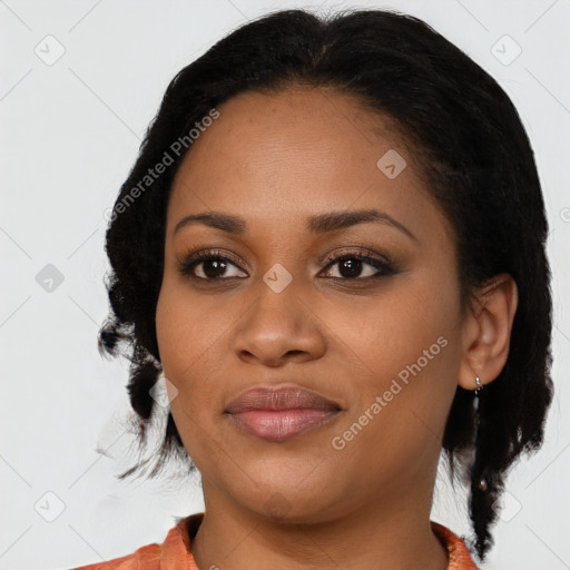 Joyful black young-adult female with medium  black hair and brown eyes