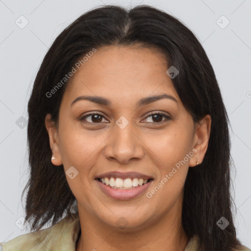 Joyful latino young-adult female with long  brown hair and brown eyes