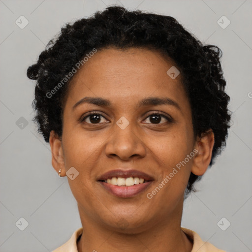 Joyful black adult female with short  brown hair and brown eyes