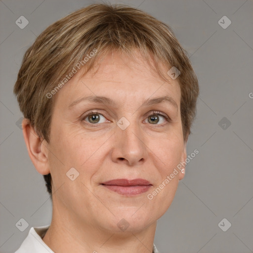 Joyful white adult female with short  brown hair and grey eyes