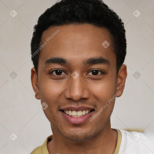 Joyful latino young-adult male with short  black hair and brown eyes