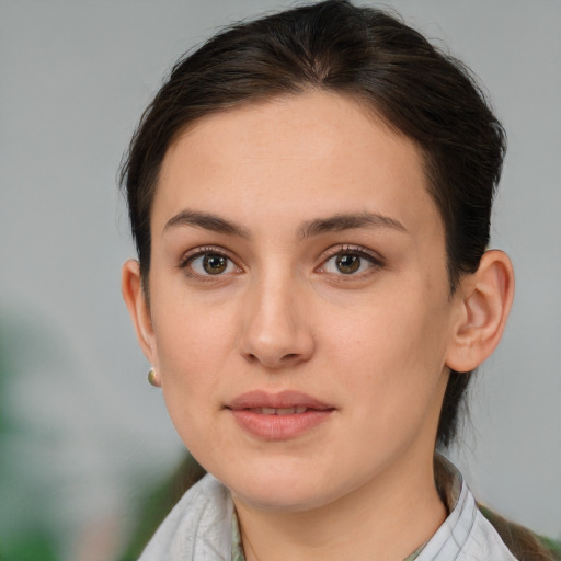 Neutral white young-adult female with medium  brown hair and brown eyes