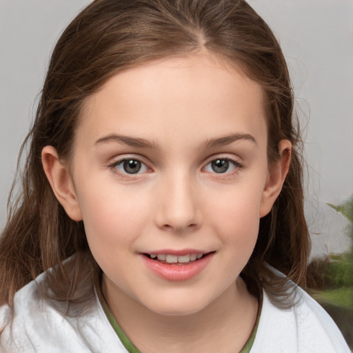 Joyful white child female with medium  brown hair and brown eyes