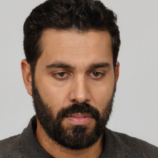 Neutral white young-adult male with short  black hair and brown eyes
