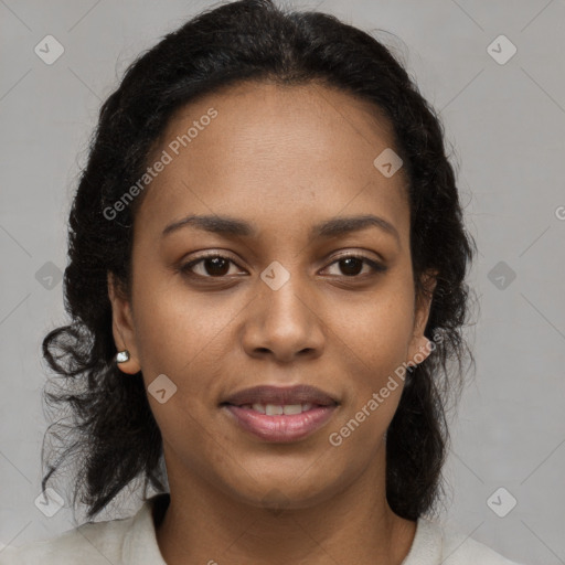 Joyful black young-adult female with medium  brown hair and brown eyes