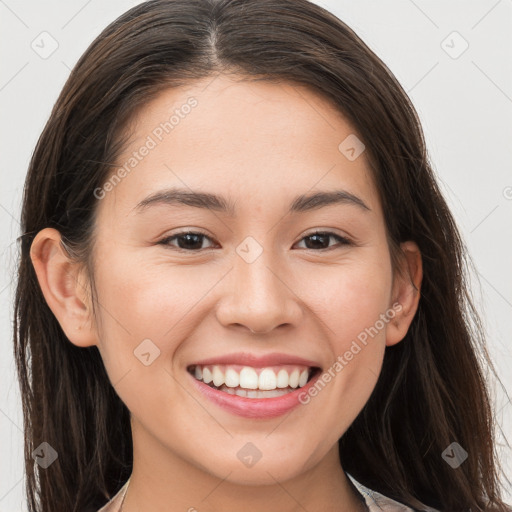 Joyful white young-adult female with long  brown hair and brown eyes