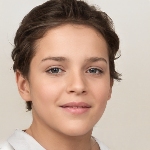 Joyful white child female with short  brown hair and brown eyes