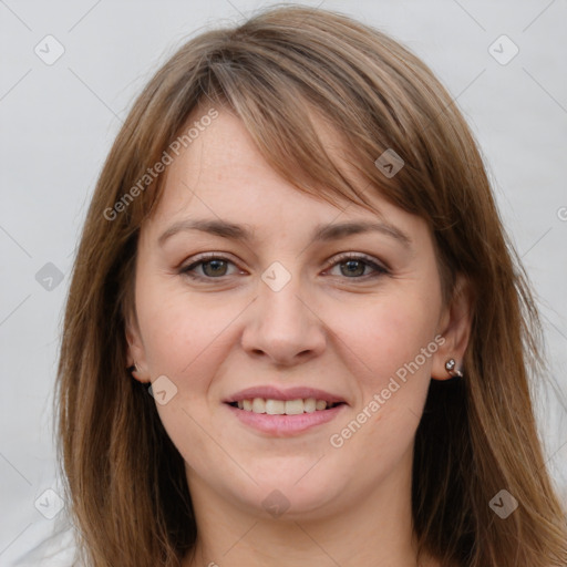 Joyful white young-adult female with long  brown hair and grey eyes