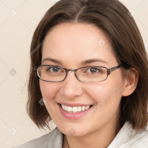 Joyful white young-adult female with medium  brown hair and blue eyes