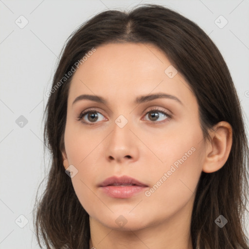 Neutral white young-adult female with long  brown hair and brown eyes